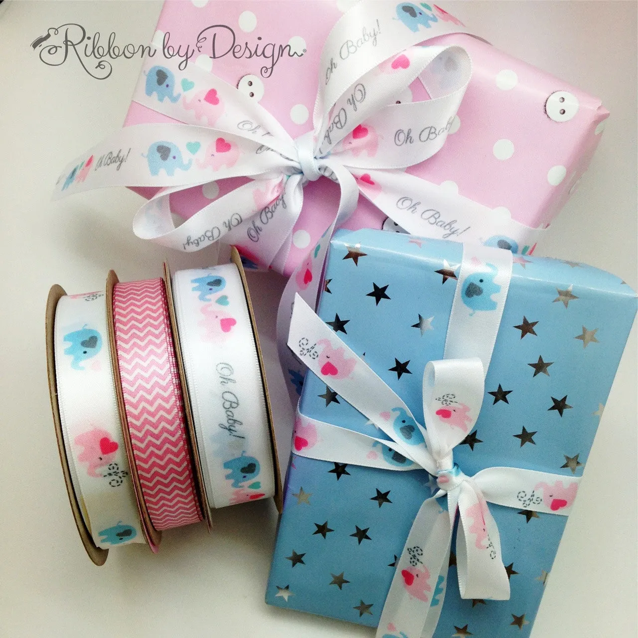 Elephants in a Row Ribbon Pink and Blue printed on 5/8" white single face satin